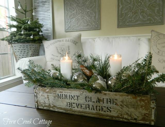 antique box with greenery and candles