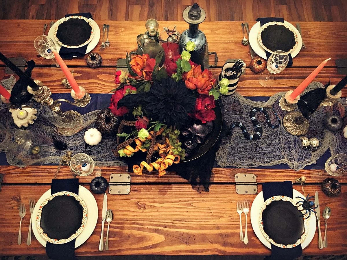 Finer-details-like-the-small-snake-and-cobwebs-make-a-big-difference-to-the-Halloween-tablescape-90072