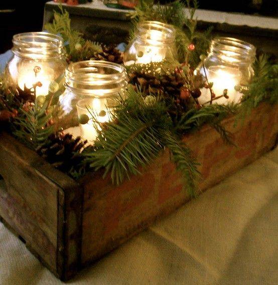 old wooden box with mason jars greenery and candles