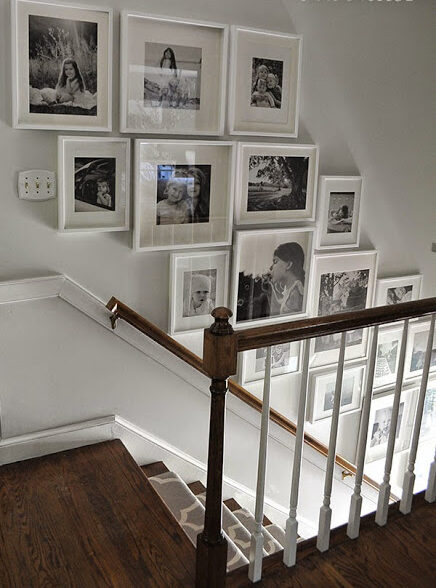 Picture gallery in the stairway that leads downstairs.