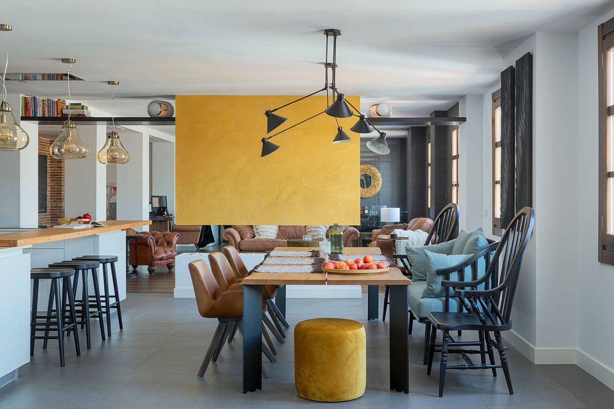 Vibrant-yellow-fireplace-wall-brings-accent-color-to-this-dining-room-86895