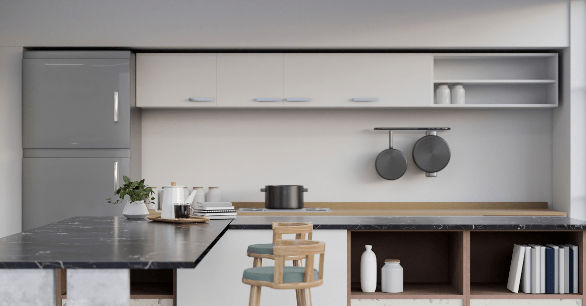 A kitchen with black countertops.