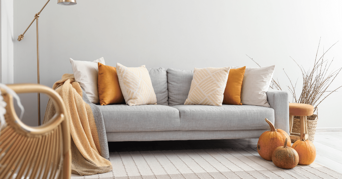 Orange and grey living room.