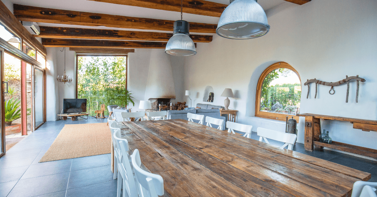 A living room dining room combo layout with lots of natural light.