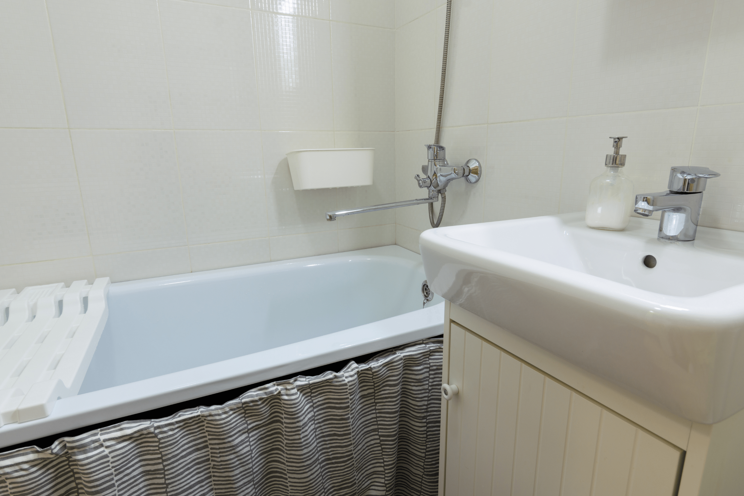 Bathroom with sink and tub.