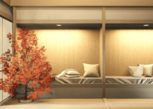 japanese style bedroom with two beds pillows and wood backing