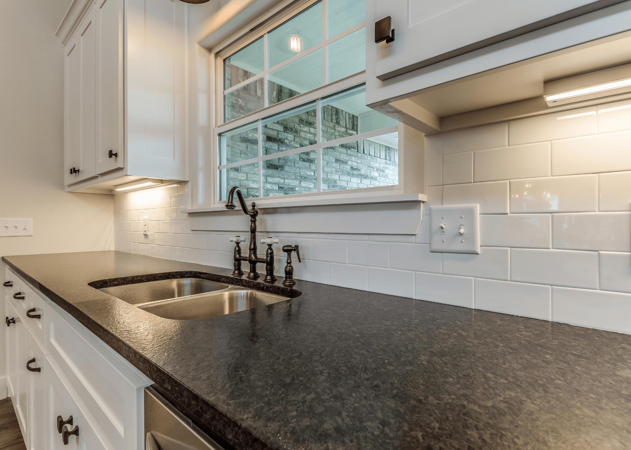 black laminate countertop close up white kitchen counters