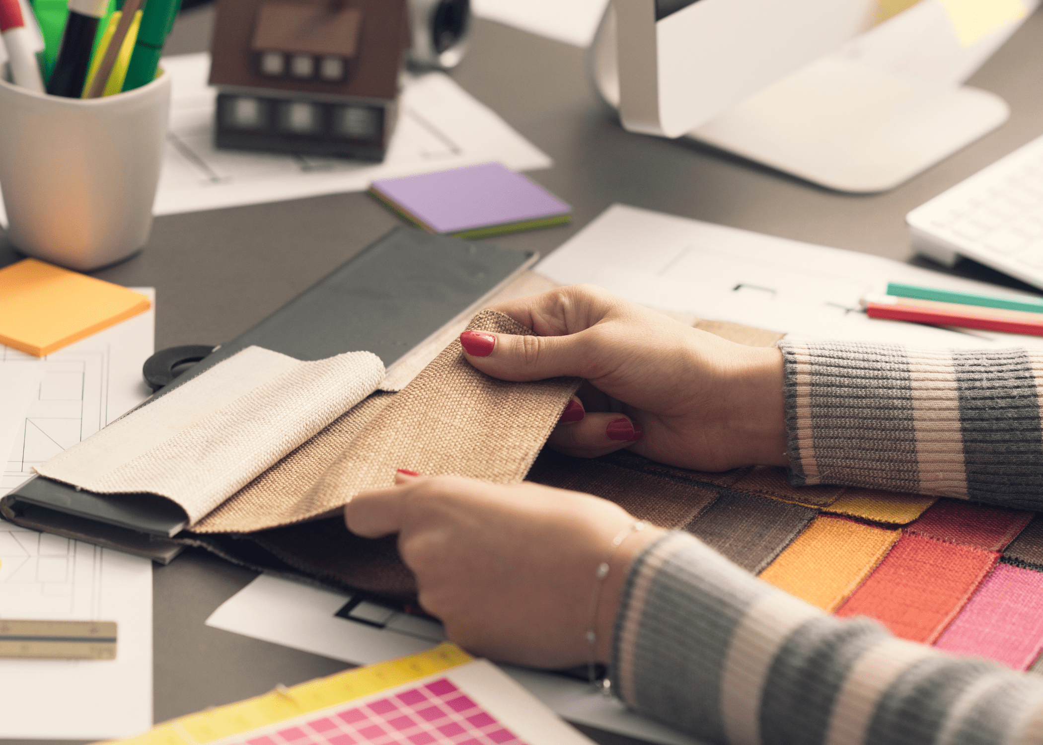 woman hands looking at fabric swatch