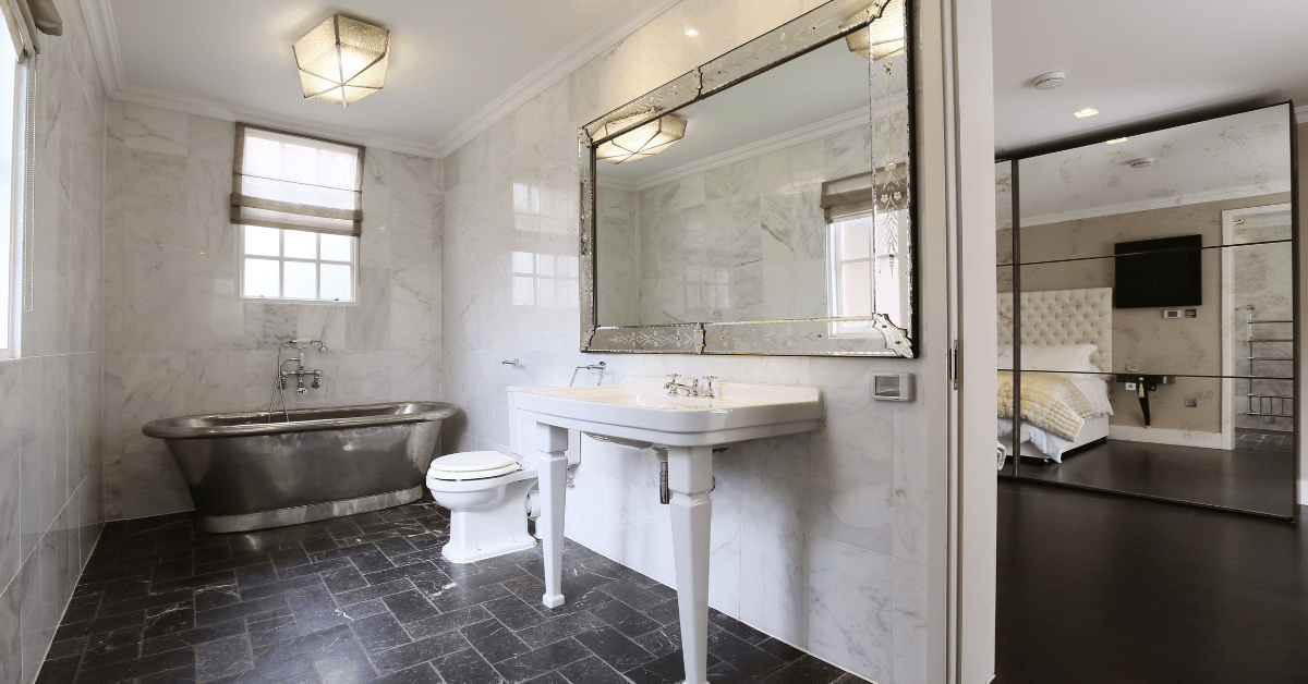 En suite bathroom with white vanity.