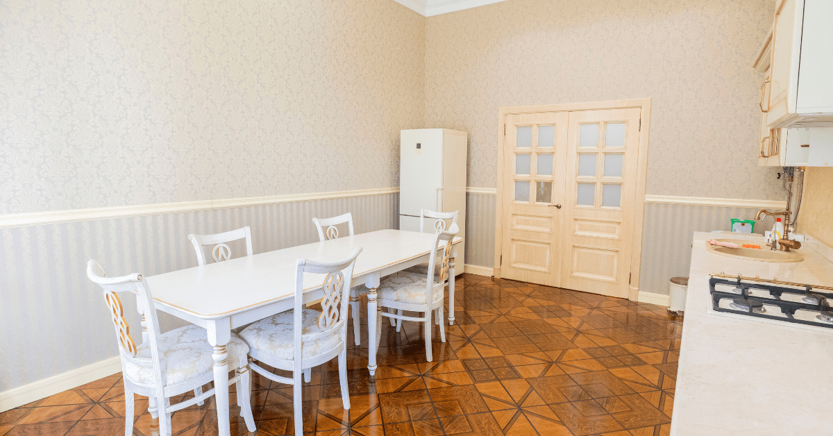 Kitchen with linoleum flooring.